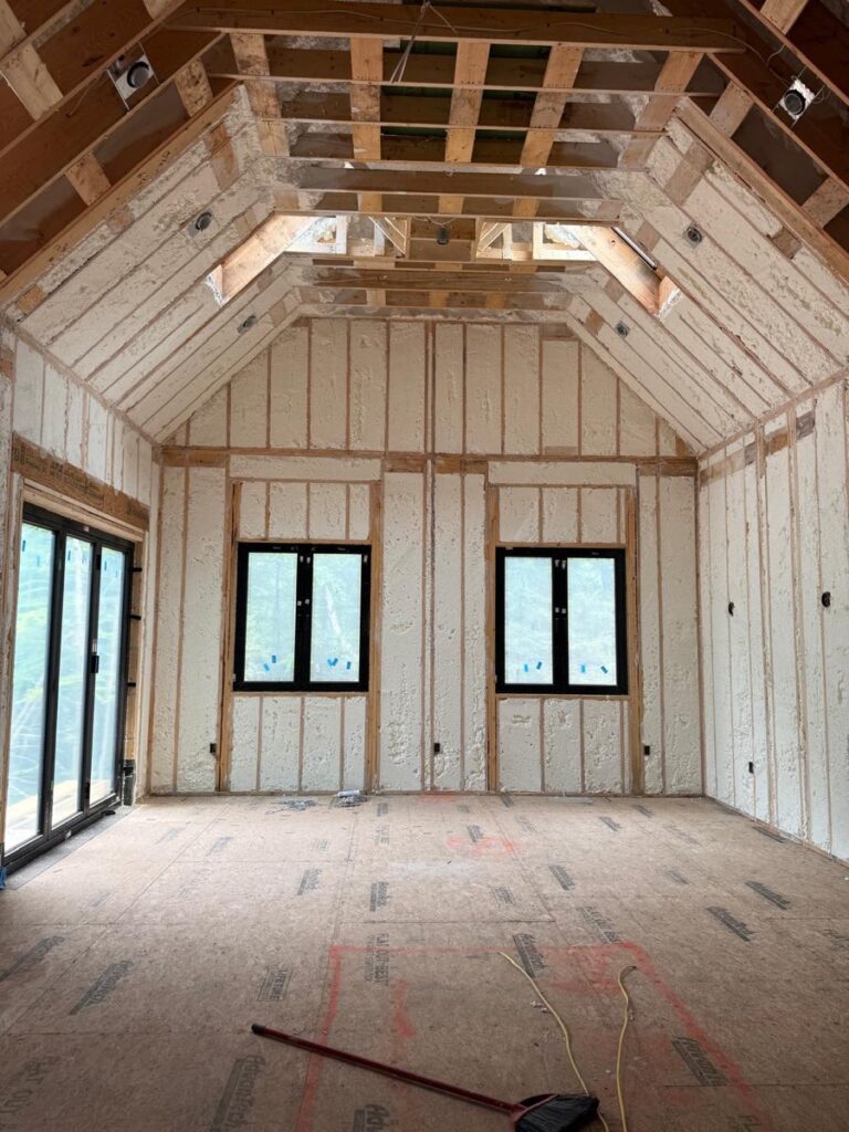 Spray foam insulation on the walls and vaulted ceiling of a new build