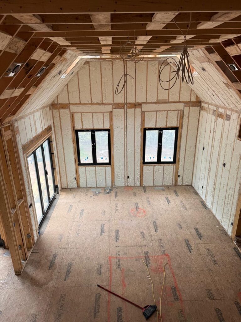 Spray foam on the gable wall and ceiling of an upstairs bedroom